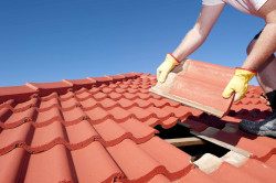 Rénovation de toiture avec réparation ou changement de tuile  
